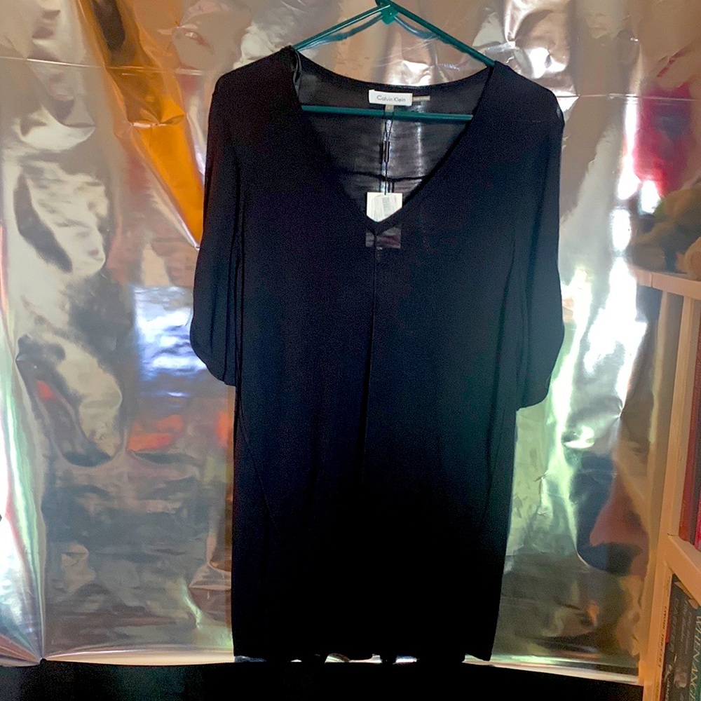 Selling a black thin , size large Calvin Klein sweater
